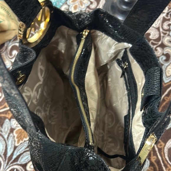 Michael Kors Black Hobo Bag with Gold Emblem - Picture 8 of 16
